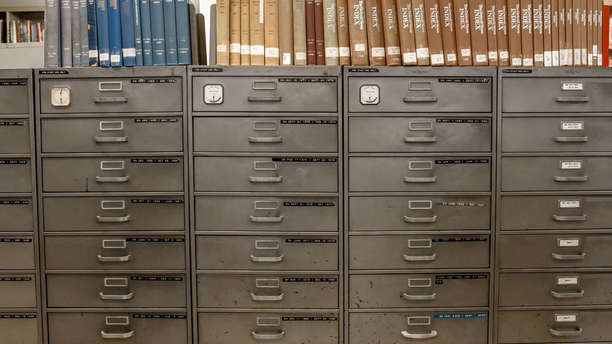 A library reading room with shelves of books
