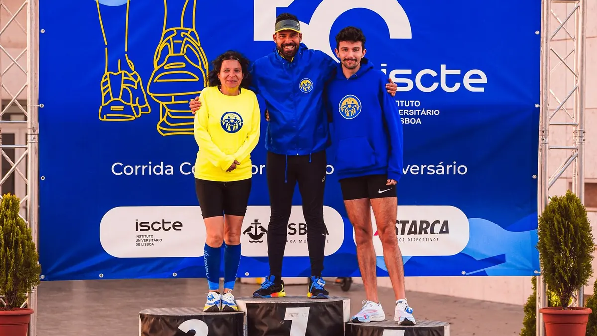 Athletes standing on a winners' podium