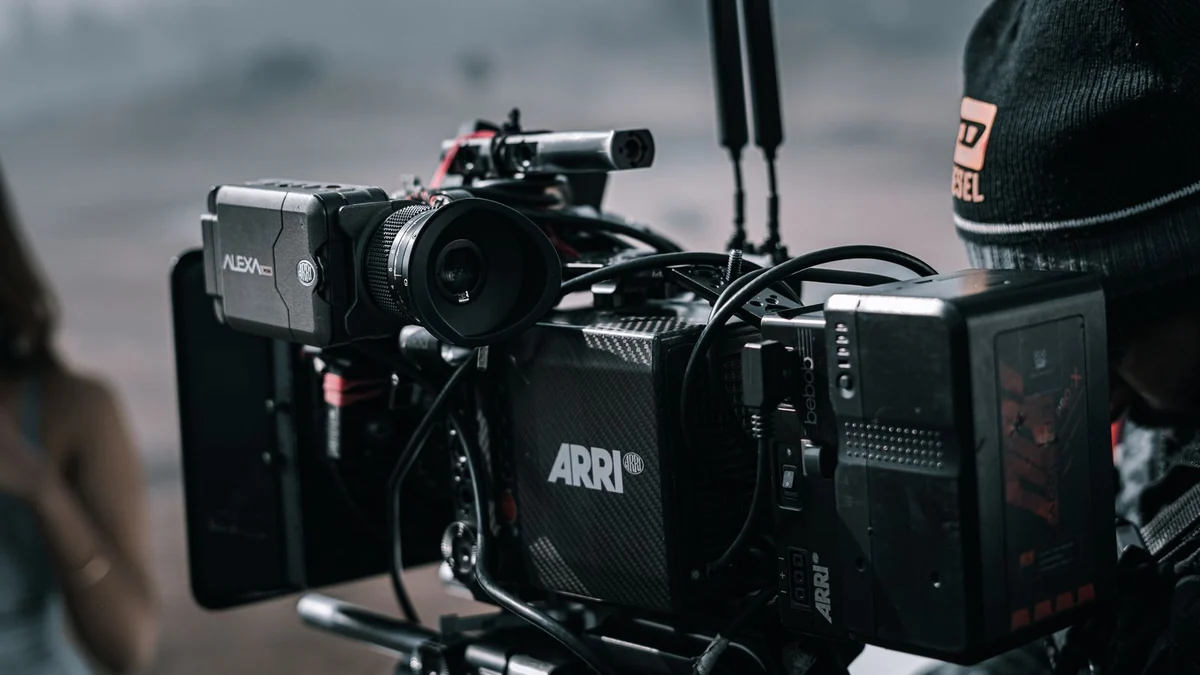 A professional film camera set up on location