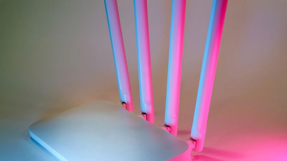 A wireless router lit by neon lighting